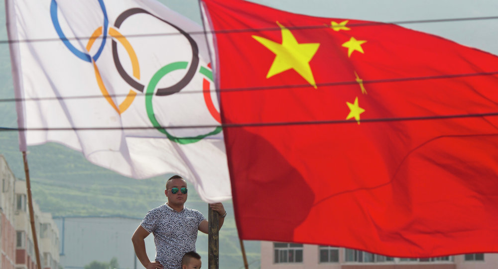 习近平：中国有信心按时完成北京2022年冬奥会的筹备工作