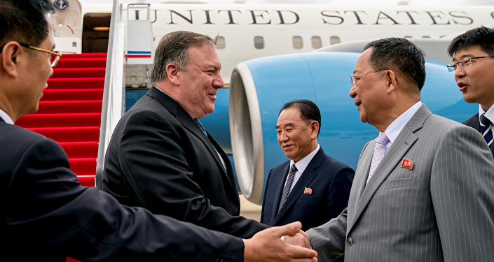 U.S. Secretary of State Mike Pompeo is greeted by North Korean Director of the United Front Department Kim Yong Chol, and North Korean Foreign Minister Ri Yong Ho, as he arrives at Sunan International Airport in Pyongyang